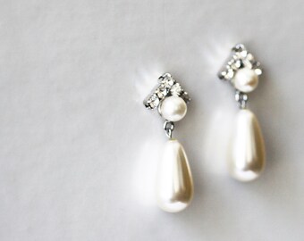 Silver plated stud earrings with 14K solid gold posts, white teardrop Swarovski pearls and clear Swarovski crystals