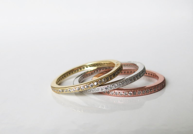 stacking rings with channel set clear cubic zirconia crystals Set of tri-colour sterling silver, rose gold and 14K gold vermeil size 8