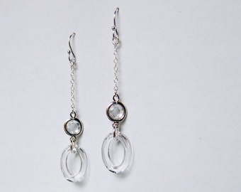 Sterling silver earrings with clear Swarovski crystal faceted loops and encased crystal spacers