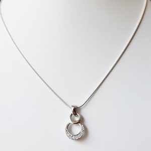 Sterling silver and clear cubic zirconia pendant