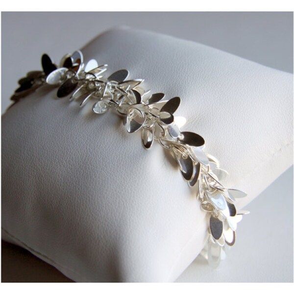 6.5" sterling silver bracelet with leaf-shaped charms