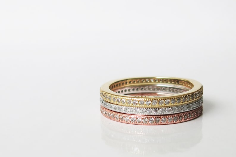 stacking rings with channel set clear cubic zirconia crystals Set of tri-colour sterling silver, rose gold and 14K gold vermeil size 8