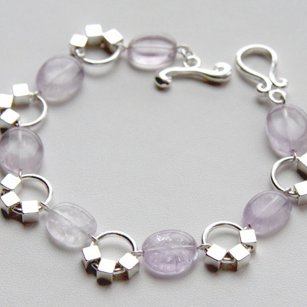 Purple amethyst gemstones and silver-plated bracelet with toggle clasp