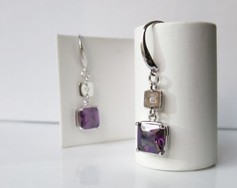 Sterling silver earrings with faceted purple cubic zirconia squares