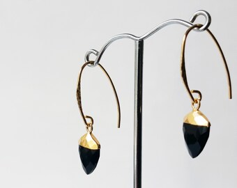 14K gold vermeil (gold on sterling silver) earrings with black faceted acorn beads with gold caps dangling from hammered hooks