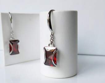 Sterling silver and deep red cubic zirconia faceted rectangle earrings
