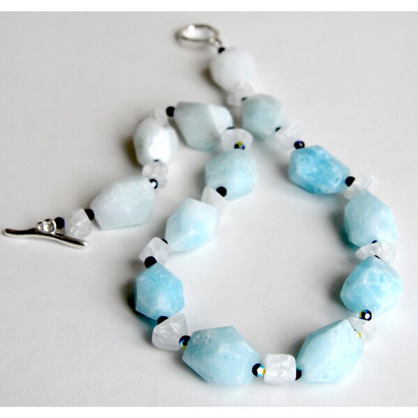 Hemimorphite and cracked crystal necklace - baby blue irregular stones with dark blue Swarovski crystal bi-cones and silver toggle