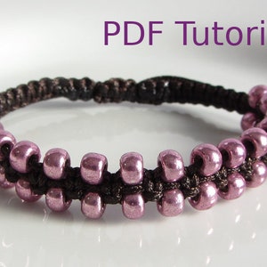 A close up of pink beaded brown macrame square knot bracelet with slider closure. Beads are arranged in two rows on the outside of the bracelet. With PDF Tutorial written on the image.