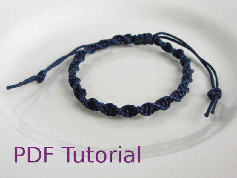 Navy blue macrame half square knot bracelet with slider closure. With PDF Tutorial written on the image.