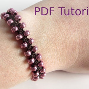 Pink beaded brown macrame square knot bracelet worn on wrist. Beads are arranged in two rows on the outside of the bracelet. With PDF Tutorial written on the image.