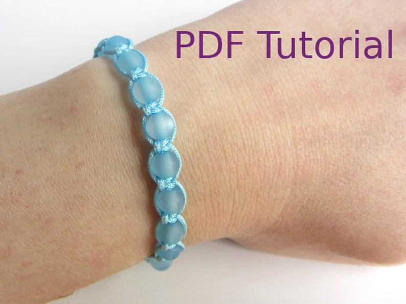 Light blue beaded macrame square knot bracelet is shown worn on wrist. With PDF Tutorial written on the image.