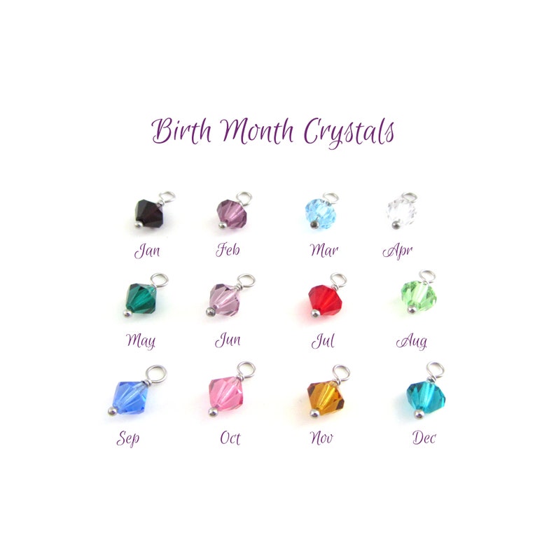 January - December bicone crystal charms. (Jan = dark red, Feb = purple, Mar = light blue, Apr = clear, May = dark green, June = pale purple, July = red, Aug = light green, Sep = blue, Oct = pink, Nov = orange, Dec = blue/green.)