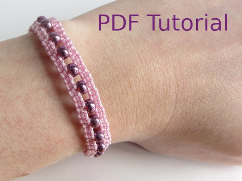 A bracelet that has a 3 row effect shown worn on wrist. The bottom and top rows are pink cord using macrame knots. The middle row is pink beads. With PDF Tutorial written on the image.