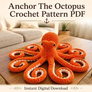 Könnte beinhalten: Ein orangefarbener Häkel-Oktopus mit weißen Akzenten auf einem Holztisch. Der Oktopus hat acht eingerollte Tentakel und einen runden Kopf. Der Text lautet "Anchor The Octopus Crochet Pattern PDF" und "Instant Digital Download".