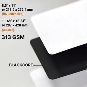 May include: A white sheet of paper layered over a black core sheet. Text displays 8.5" x 11" (US Letter size), 11.69" x 16.54" (A3 size), 313 GSM, and the label BLACKCORE, indicating the paper thickness and available dimensions for this product.