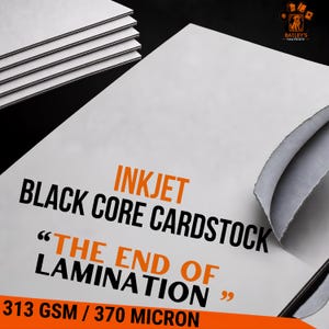 May include: A stack of white inkjet black core cardstock with a curled corner revealing a dark interior. The text reads: INKJET BLACK CORE CARDSTOCK THE END OF LAMINATION 313 GSM / 370 MICRON. A logo for Bailey's Paw Prints is in the corner.