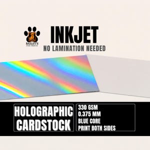 May include: Holographic cardstock with a rainbow reflective surface and a plain white side. Text includes INKJET, NO LAMINATION NEEDED, BAILEY'S PAW PRINTS, HOLOGRAPHIC CARDSTOCK, 330 GSM, 0.375 MM, BLUE CORE, and PRINT BOTH SIDES.
