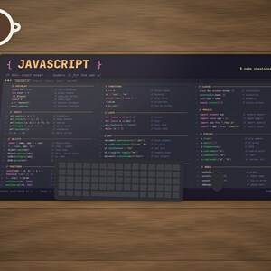 May include: A dark-themed desk mat featuring a comprehensive JavaScript cheat sheet with code snippets for variables, arrays, objects, functions, loops, and DOM manipulation. A dark grey computer keyboard rests on the mat, which also displays the text JavaScript and node cheatsheet.js.