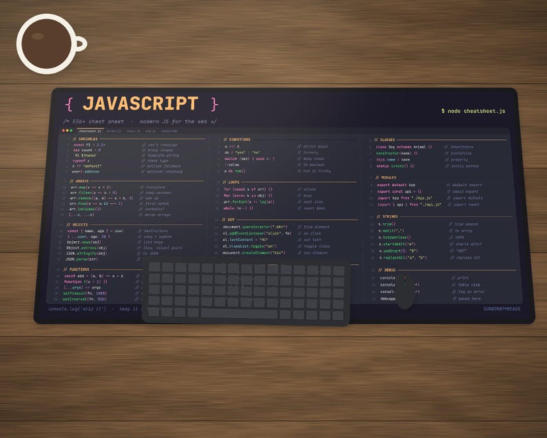 May include: A dark-themed desk mat featuring a comprehensive JavaScript cheat sheet with code snippets for variables, arrays, objects, functions, loops, and DOM manipulation. A dark grey computer keyboard rests on the mat, which also displays the text JavaScript and node cheatsheet.js.
