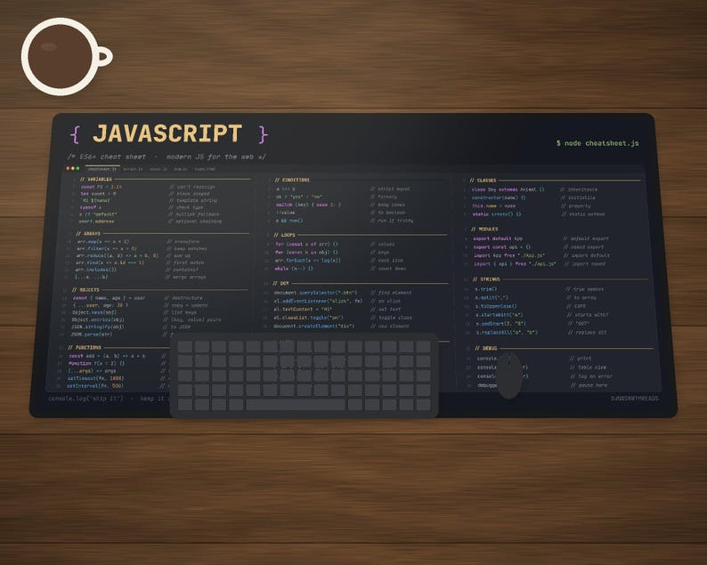 May include: A black rectangular desk mat featuring a white JavaScript cheat sheet with code snippets for variables, arrays, objects, functions, conditions, loops, DOM, classes, modules, strings, and debug. A dark grey keyboard sits on the mat.