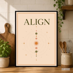 May include: A rectangular wall art print in a black frame featuring a light peach background with the word ALIGN in dark green letters. The design includes a central sun, orbiting planets, and small stars in shades of orange and green.