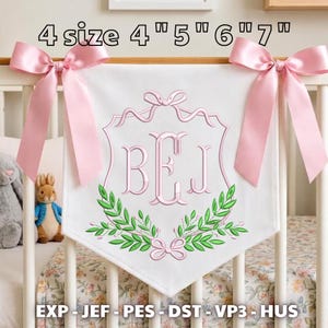 May include: A white fabric banner featuring a pink embroidered monogram with the letters BEJ inside a decorative frame with green leaves and pink bows. The banner is adorned with large pink satin bows on the top corners. Text reads 4 size 4" 5" 6" 7" and EXP JEF PES DST VP3 HUS.
