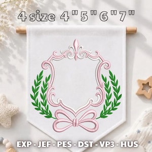 May include: A white fabric banner featuring an embroidered pink ornate frame with a fleur-de-lis top, green laurel branches, and a pink bow at the bottom. The text 4 size 4" 5" 6" 7" and EXP - JEF - PES - DST - VP3 - HUS are printed on the image.