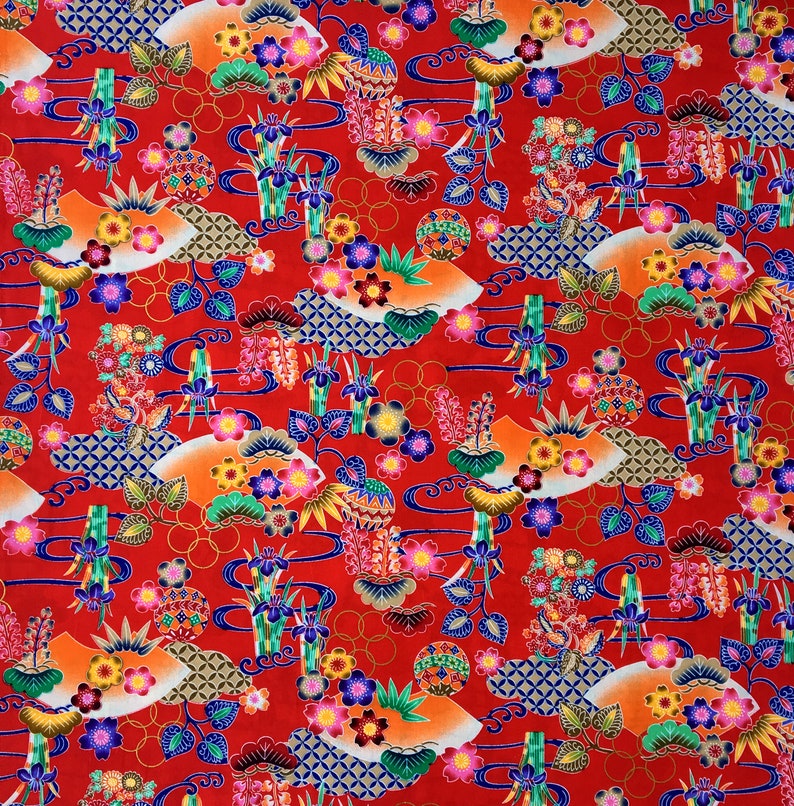 May include: Red fabric with a repeating pattern of colorful flowers, leaves, and geometric shapes. The design is inspired by traditional Japanese art.