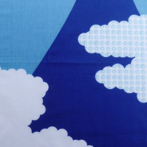 May include: A fabric panel featuring a stylised mountain with a white snow-capped peak against a large red sun. The background transitions from light blue to dark blue, decorated with white clouds and clouds with a light blue circular pattern.
