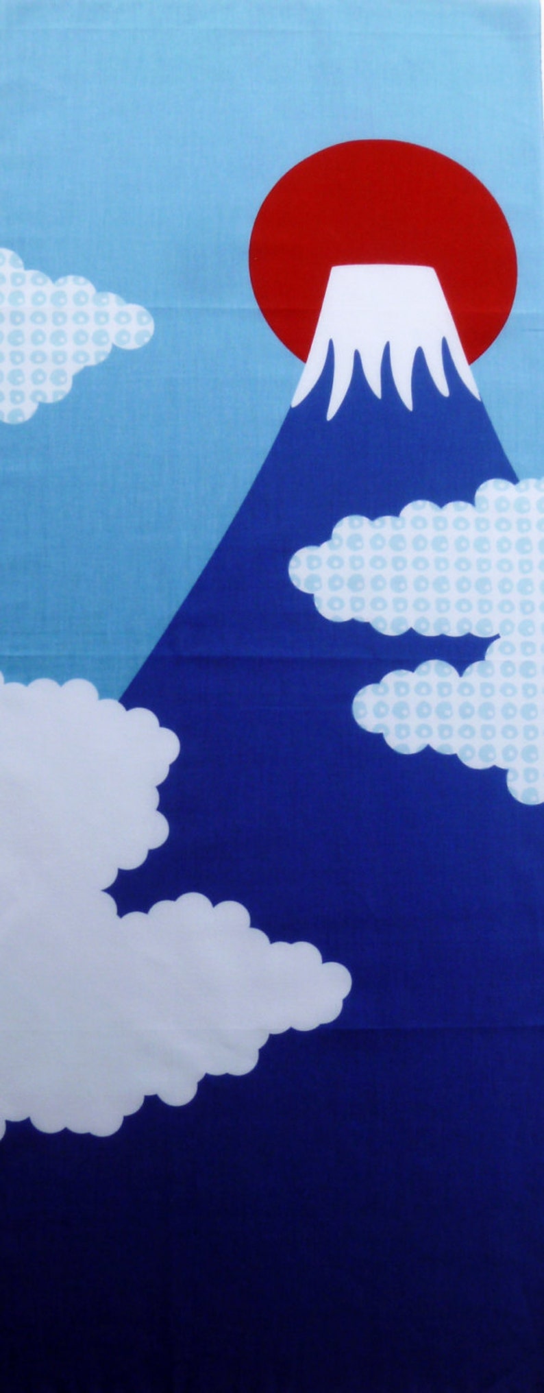 May include: A fabric panel featuring a stylised mountain with a white snow-capped peak against a large red sun. The background transitions from light blue to dark blue, decorated with white clouds and clouds with a light blue circular pattern.