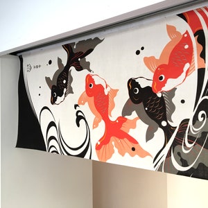 May include: A white fabric panel with a black and red Japanese-style design featuring four stylized fish, two black and two red, swimming in a swirling pattern. The panel has the text "魚々" in black.