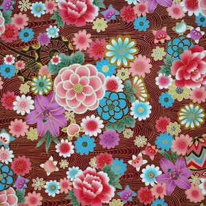 May include: A fabric pattern featuring a deep maroon background with intricate gold wavy lines. The design includes a dense arrangement of colorful flowers in shades of pink, red, light blue, and purple, interspersed with small geometric patterned spheres.