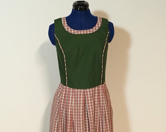 Traditional dress in green and red with a plaid skirt, sleeveless summer dress