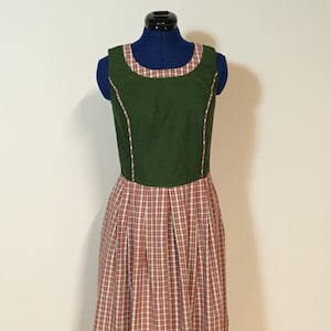 Traditional dress in green and red with a plaid skirt, sleeveless summer dress