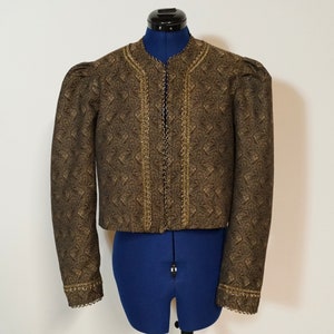 Traditional jacket made of Paisley jacquard, decorated with gold border