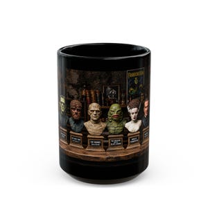 May include: A black ceramic mug featuring a wrap-around graphic of six classic horror movie monster busts on pedestals. The characters include Frankenstein, The Wolf Man, The Mummy, The Creature from the Black Lagoon, Bride of Frankenstein, and Dracula.