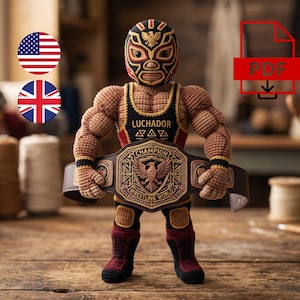 May include: A crocheted luchador doll with tan skin, wearing a black and red mask, a black tank top with the word LUCHADOR, and dark red and black boots. The doll holds a large brown championship belt featuring an eagle and the text CHAMPION WRESTLING WORLD.