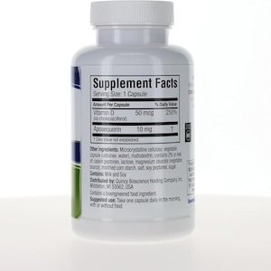 May include: A white plastic supplement bottle with a screw-top lid featuring a Supplement Facts label. The label lists Vitamin D 50 mcg and Apoaequorin 10 mg per capsule, with ingredients including microcrystalline cellulose, milk, and soy.
