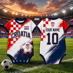 May include: A baby bodysuit with a Croatian soccer theme. The front features the word "CROATIA", a soccer ball, and the Croatian flag. The back has space for a name and the number 10. Red, white, and blue colors dominate the design.