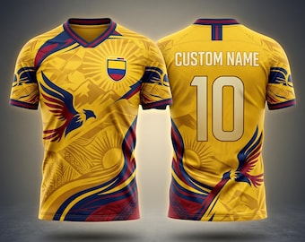 May include: A yellow soccer jersey with a V-neck design, featuring a crest and eagle graphic. The jersey has red and blue accents, with the number 10 on the back and the text "CUSTOM NAME".