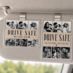 May include: Two clear acrylic car visor clips featuring black and white photo collages. The horizontal clip displays the text DRIVE SAFE WE LOVE YOU. The vertical clip displays the text DRIVE SAFE SEE YOU SOON WE LOVE YOU with a small heart icon.
