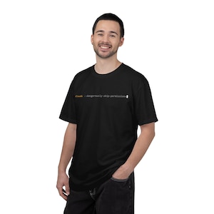 May include: A black short-sleeved t-shirt featuring a command line interface graphic on the chest. The text reads "claude --dangerously-skip-permissions" with the word "claude" in orange and the rest of the command in white text.