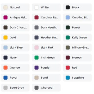 May include: A color chart featuring twenty-one rectangular swatches with rounded corners, each labeled with text including Natural, White, Black, Antique Hel, Cardinal Re, Carolina Bl, Dark Choco, Dark Heath, Forest, Gold, Heather Na, Kelly Green, Light Blue, Light Pink, Military Gre, Navy, Irish Green, Maroon, Orange, Purple, Red, Royal, Sand, Sapphire, Sport Gray, and Charcoal.