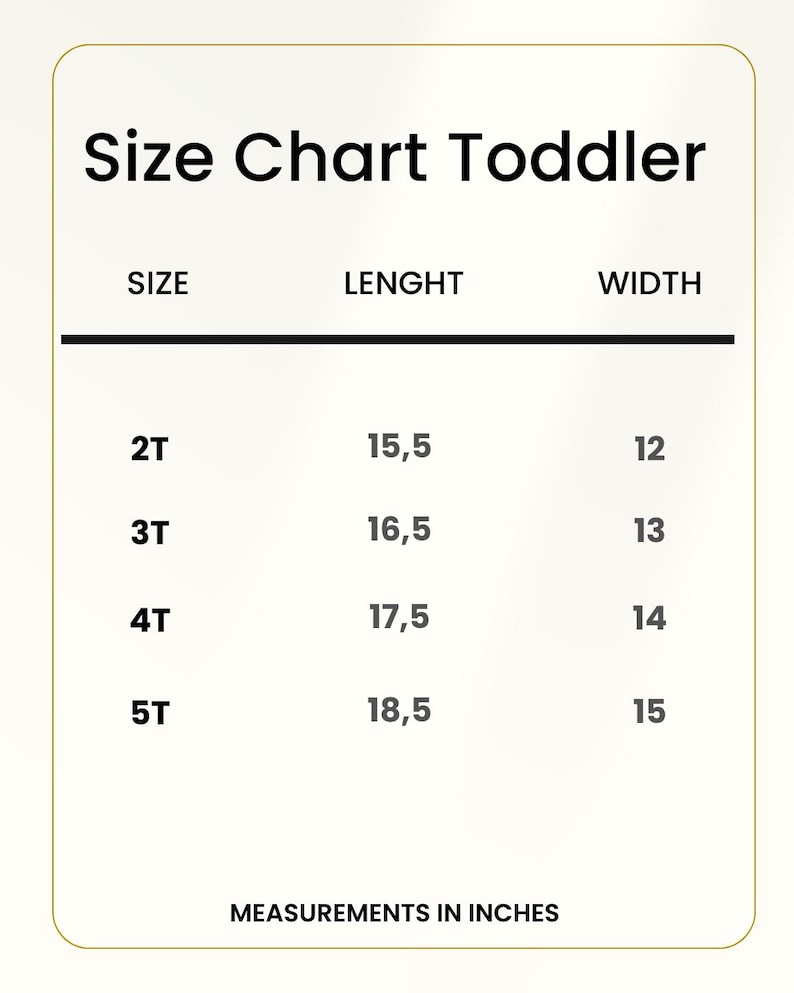 May include: A white toddler size chart with black text. The chart lists sizes 2T, 3T, 4T, and 5T with corresponding length and width measurements in inches. The header reads Size Chart Toddler, and the footer states Measurements in inches.