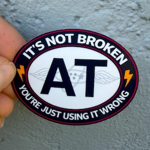 AT Rate Slogan Sticker - “It’s not broken, you’re just using it wrong”