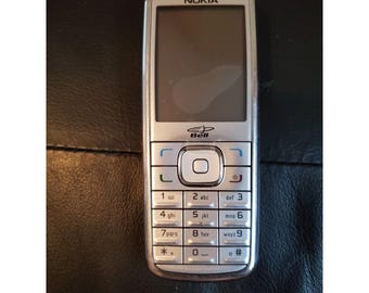 Stary telefon komórkowy Nokia 6275i Silver Bell z Kanady do naprawy na części