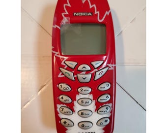Klasyczny telefon komórkowy Nokia 3360 Roots Canada Edition z czerwoną płytką czołową w kolorze liścia klonowego