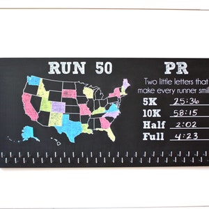 Run 50 States Medal Holder with PR Running Times list and 50 hooks onChalkboard