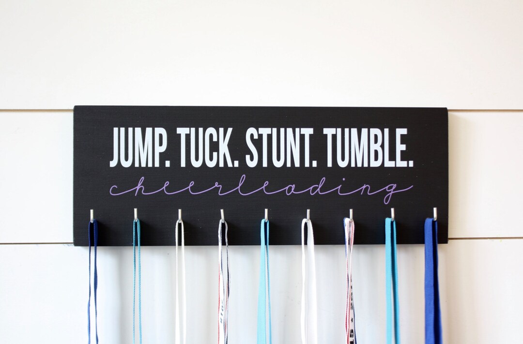 Cheer Medal Holder / Display Jump. Tuck. Stunt. Tumble. Cheerleading