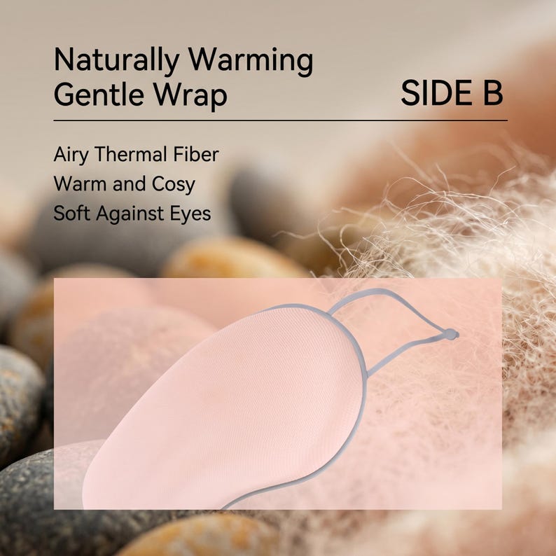 May include: A pink eye mask with a grey trim and string, labelled "SIDE B." The text on the image reads "Naturally Warming Gentle Wrap," "Airy Thermal Fiber," "Warm and Cosy," and "Soft Against Eyes."